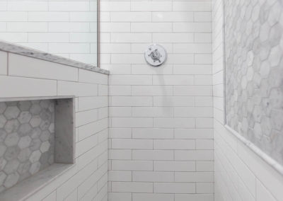ensuite transitional bathroom clarendon hills illinois marble subway shower octagon white vanity