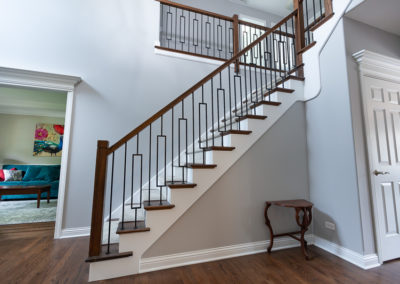 modern staircase remodel iron balusters stained handrail elmhurst, illinois