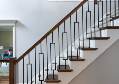 modern staircase remodel iron balusters stained handrail elmhurst, illinois