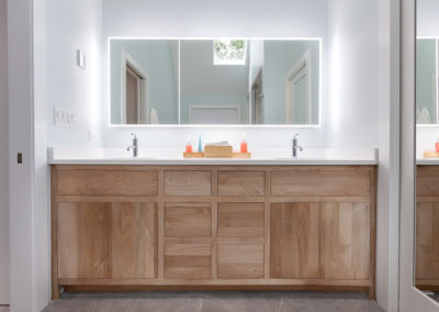 master bathroom remodel quartz surround free standing soaker tub porcelain floor bleached walnut vanity lit mirror contemporary clarendon hills illinois