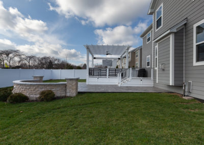 back deck pergola stamped concrete patio fire pit outdoor tv glen ellyn illinois