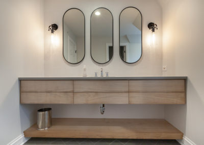 textured chevon tile powder room remodel bleached walnut oak shelf herringbone