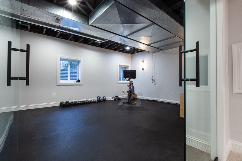 Laundry Room and Basement Gym in Clarendon Hills, Illinois