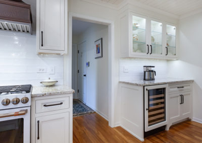 farmhouse kitchen remodel laundry room herringbone shiplap ceiling vintage range white kitchen granite subway backsplash