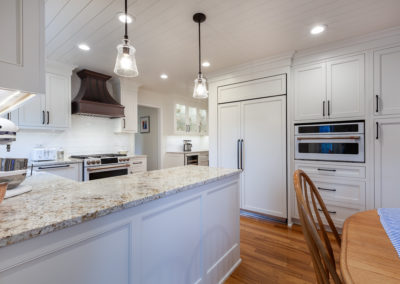 farmhouse kitchen remodel laundry room herringbone shiplap ceiling vintage range white kitchen granite subway backsplash