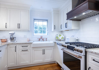 farmhouse kitchen remodel laundry room herringbone shiplap ceiling vintage range white kitchen granite subway backsplash