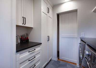 farmhouse kitchen remodel laundry room herringbone shiplap ceiling vintage range white kitchen granite subway backsplash