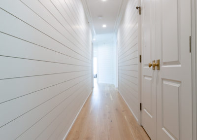 coastal home remodeling, ship lap hallway, ship lap staircase, white oak floor, clarendon hills, hyland homes