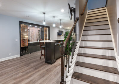 basement bar and wine room storage brick backsplash hyland homes clarendon hills, illinois