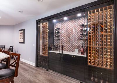 basement bar and wine room storage brick backsplash hyland homes clarendon hills, illinois