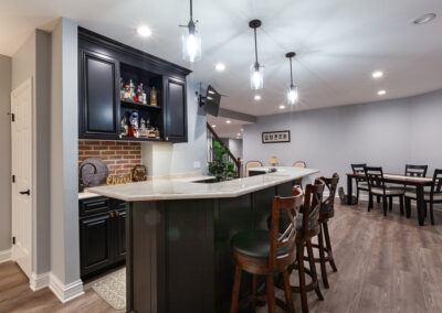 basement bar and wine room storage brick backsplash hyland homes clarendon hills, illinois