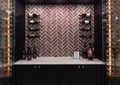 basement bar and wine room storage brick backsplash hyland homes clarendon hills, illinois