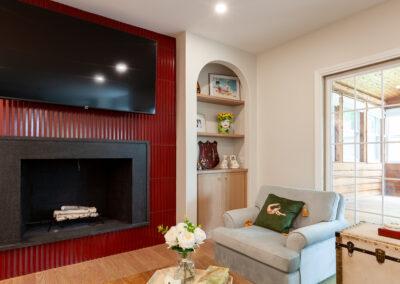 white oak cabinets Ruby Red Fluted D Polished Porcelain Tile fireplace remodel living room clarendon hills illinois