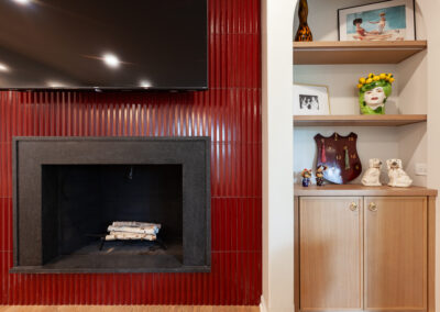 white oak cabinets Ruby Red Fluted D Polished Porcelain Tile fireplace remodel living room clarendon hills illinois