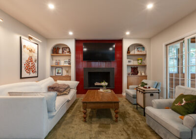 white oak cabinets Ruby Red Fluted D Polished Porcelain Tile fireplace remodel living room clarendon hills illinois